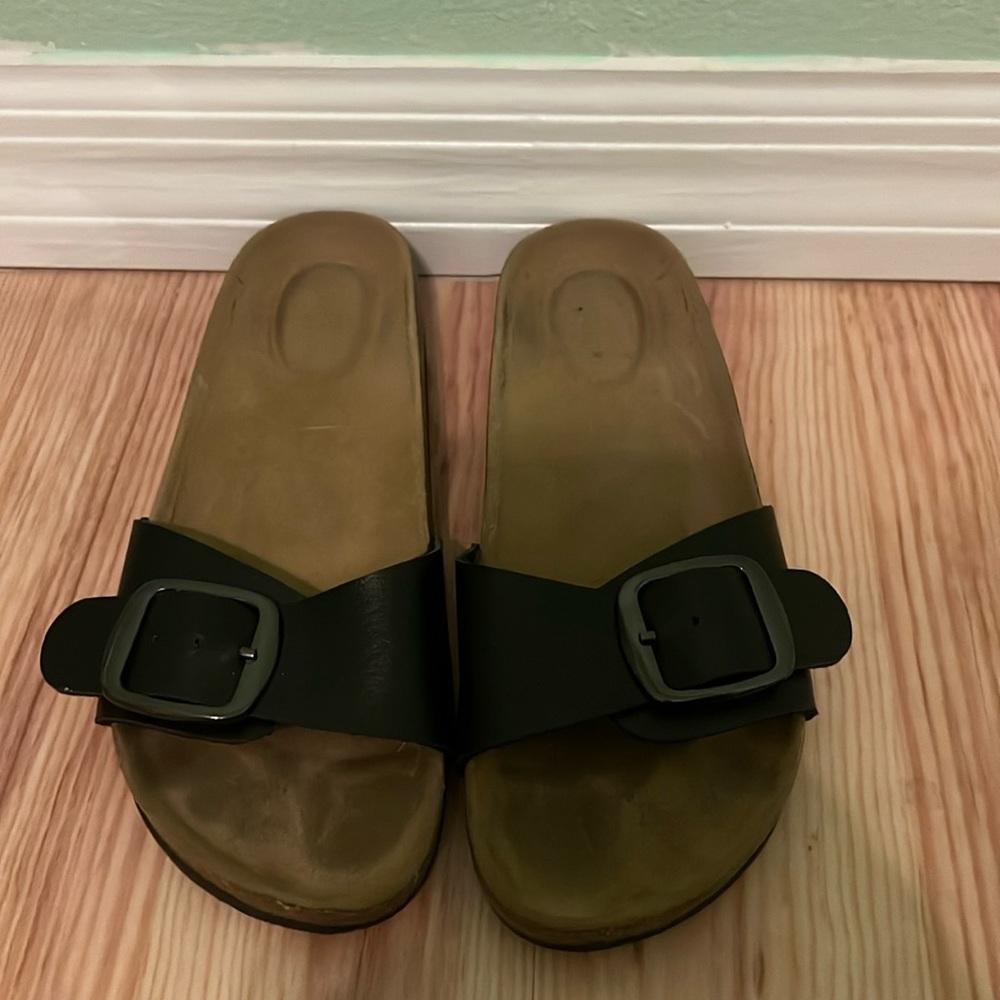 Size 6.5 women’s leather buckled slides